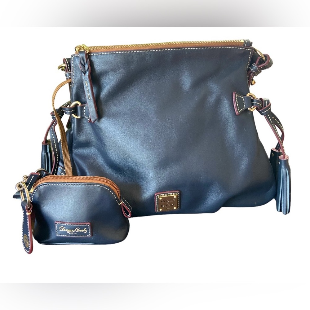 Dooney & Bourke Blue color Handbag with pouch.